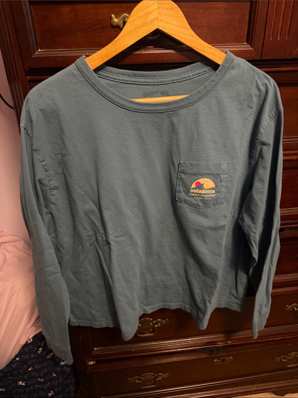 Patagonia Slate Blue Long-Sleeve Pocket Tee with Sunset Logo